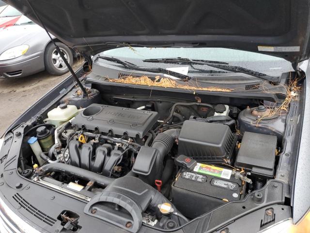 Photo 11 from auction – 2009 KIA OPTIMA LX with VIN KNAGE228395324393