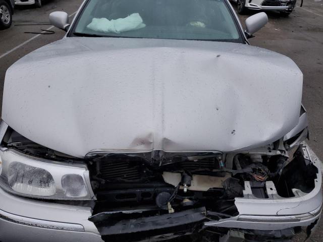 Photo 11 from auction – 2000 LINCOLN TOWN CAR C with VIN 1LNHM83W0YY804751