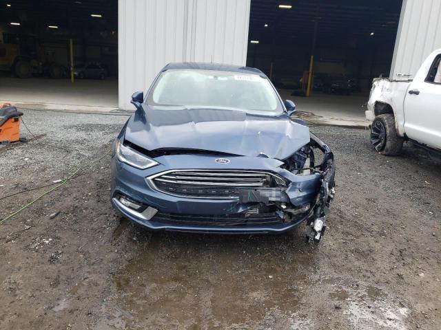 Photo 5 from auction – 2018 FORD FUSION TIT with VIN 3FA6P0D93JR128240