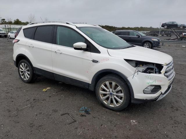 Photo 4 from auction – 2018 FORD ESCAPE TIT with VIN 1FMCU9J98JUC53639