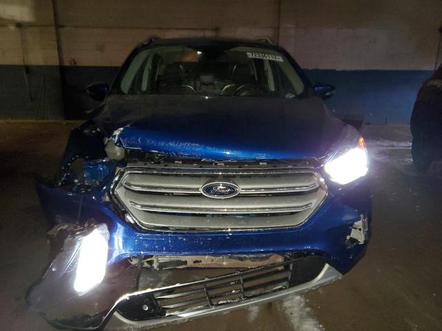 Photo 5 from auction – 2019 FORD ESCAPE TIT with VIN 1FMCU9J95KUC24021