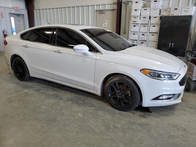 Photo 4 from auction – 2018 FORD FUSION TIT with VIN 3FA6P0D98JR226339