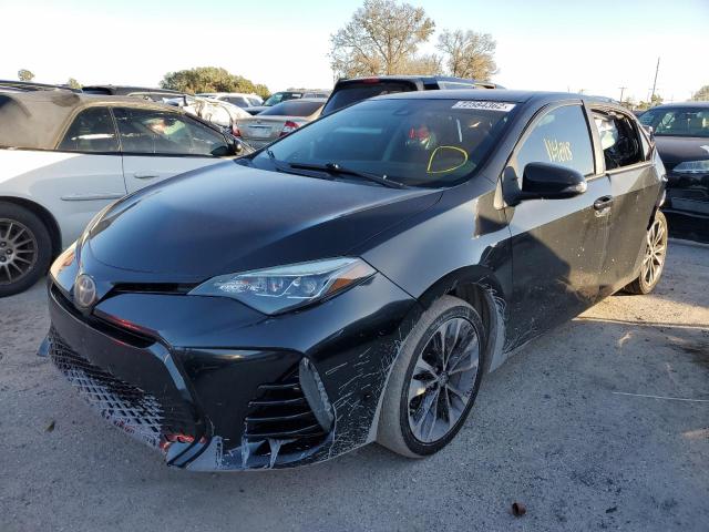 TOYOTA COROLLA L 2017 with VIN 2T1BURHE8HC774564 - Photo from auction