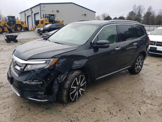 HONDA PILOT TOUR 2021 with VIN 5FNYF6H91MB004556 - Photo from auction