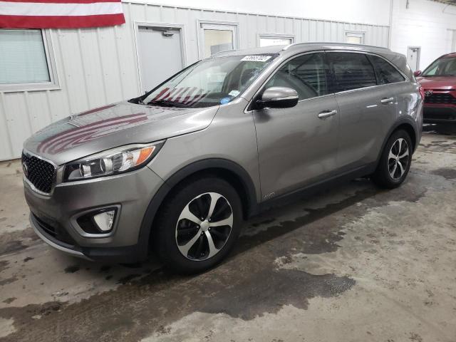 KIA SORENTO EX 2016 with VIN 5XYPHDA15GG015684 - Photo from auction