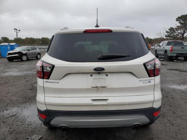 Photo 6 from auction – 2018 FORD ESCAPE TIT with VIN 1FMCU9J98JUC53639