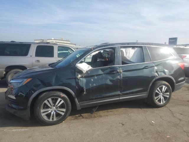 HONDA PILOT EXL 2016 with VIN 5FNYF5H80GB005798 - Photo from auction