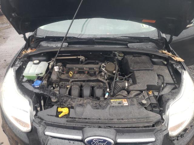 Photo 11 from auction – 2014 FORD FOCUS SE with VIN 1FADP3F22EL185090