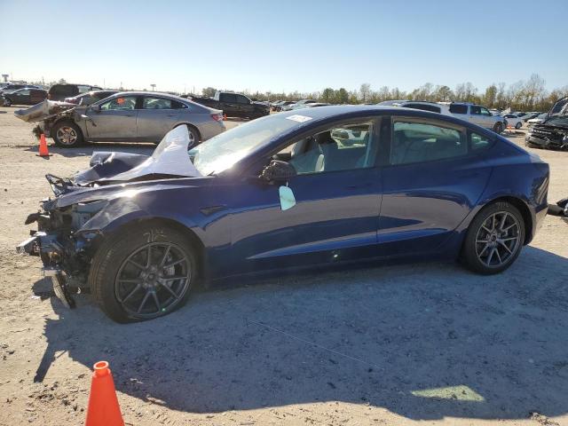 TESLA MODEL 3 2022 with VIN 5YJ3E1EBXNF305125 - Photo from auction