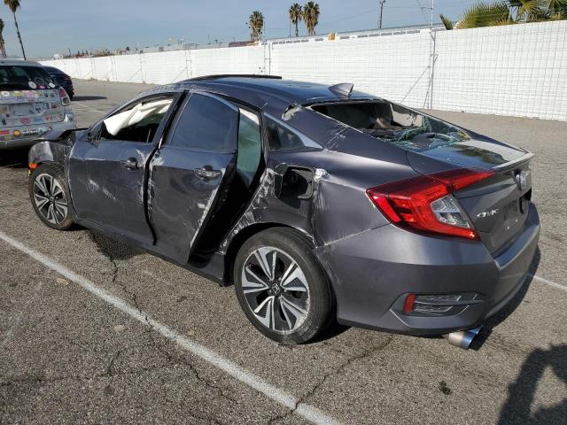 Photo 2 from auction – 2016 HONDA CIVIC EX with VIN 2HGFC1F35GH651933
