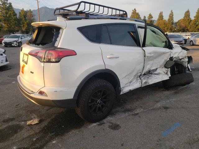 Photo 3 from auction – 2017 TOYOTA RAV4 XLE with VIN JTMRFREV3HJ158899