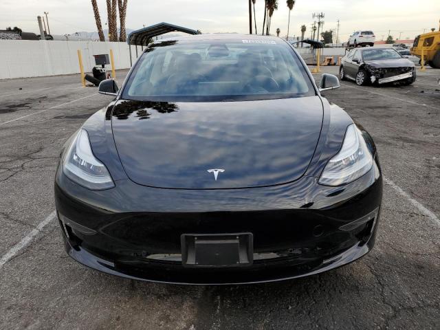Photo 5 from auction – 2018 TESLA MODEL 3 with VIN 5YJ3E1EA9JF039517