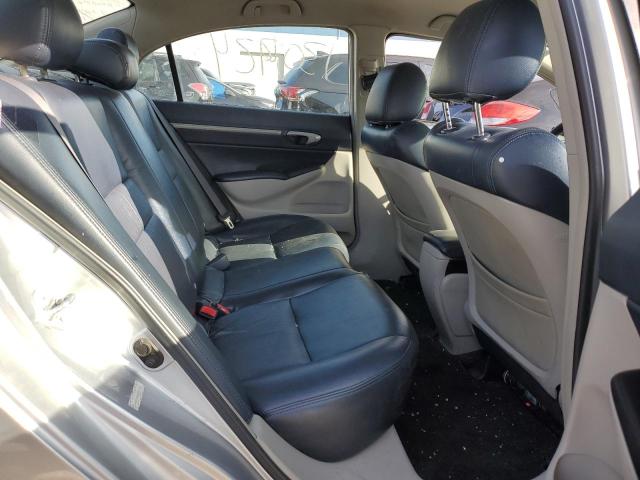 Photo 10 from auction – 2006 HONDA CIVIC HYBR with VIN JHMFA36226S010283