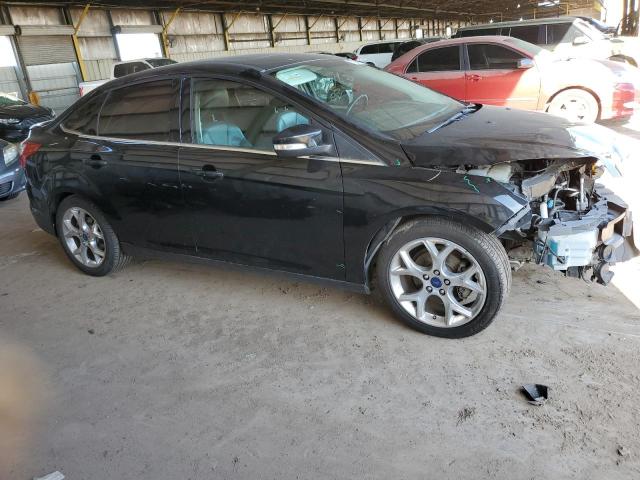 Photo 4 from auction – 2014 FORD FOCUS TITA with VIN 1FADP3J26EL408027