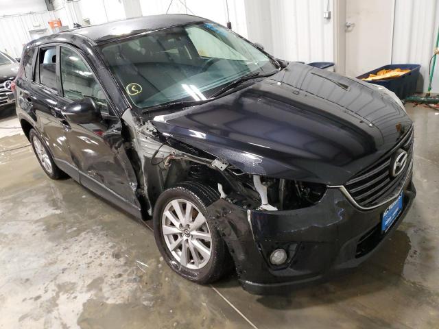 Photo 4 from auction – 2016 MAZDA CX-5 TOURI with VIN JM3KE2CY7G0863709