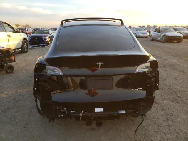 Photo 6 from auction – 2021 TESLA MODEL Y with VIN 5YJYGAEE4MF270185