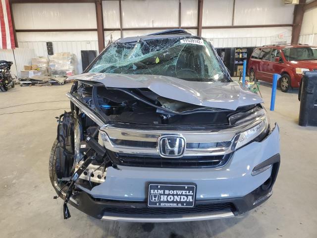 Photo 5 from auction – 2022 HONDA PILOT ELIT with VIN 5FNYF6H04NB057433