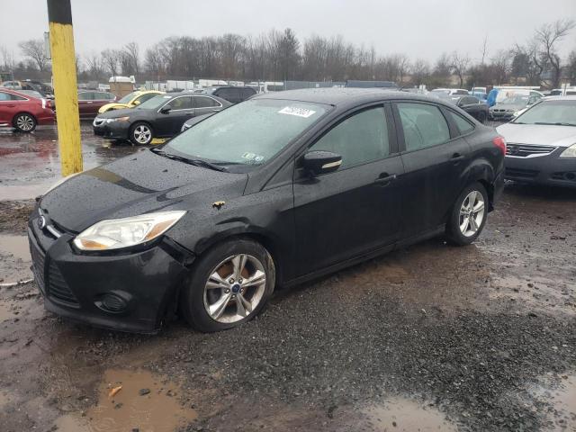 FORD FOCUS SE 2014 with VIN 1FADP3F22EL185090 - Photo from auction