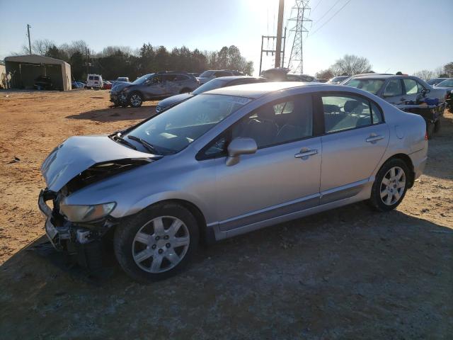 HONDA CIVIC LX 2009 with VIN 19XFA16559E020295 - Photo from auction