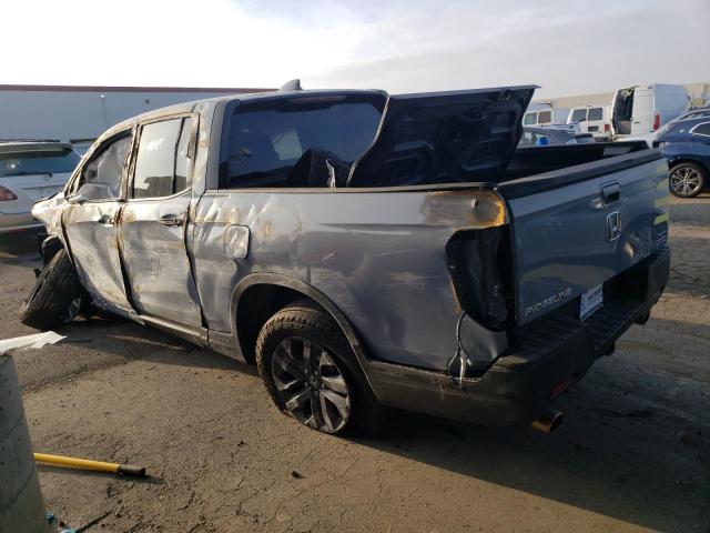 Photo 2 from auction – 2022 HONDA RIDGELINE with VIN 5FPYK3F15NB019979