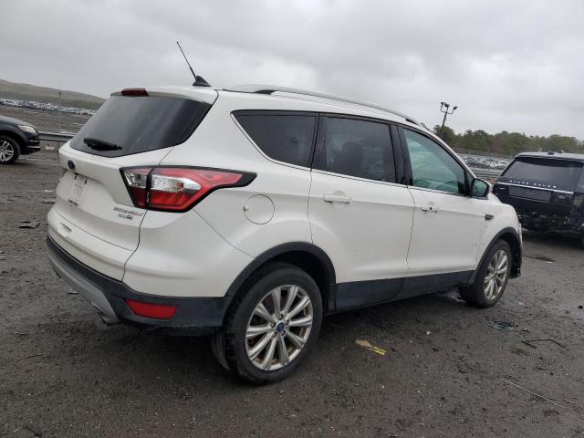 Photo 3 from auction – 2018 FORD ESCAPE TIT with VIN 1FMCU9J98JUC53639