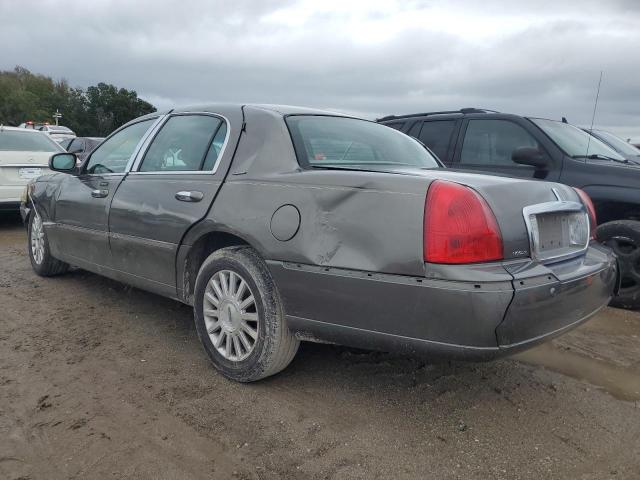 Photo 2 from auction – 2004 LINCOLN TOWN CAR E with VIN 1LNHM81W24Y655286