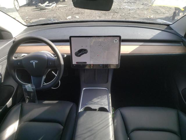 Photo 8 from auction – 2021 TESLA MODEL 3 with VIN 5YJ3E1EA5MF907310
