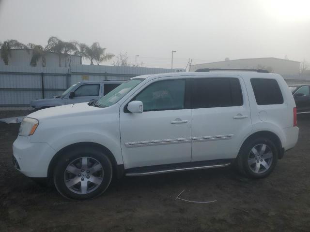 HONDA PILOT TOUR 2015 with VIN 5FNYF3H95FB003976 - Photo from auction