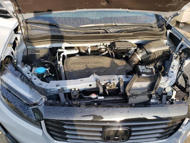Photo 11 from auction – 2022 HONDA RIDGELINE with VIN 5FPYK3F15NB019979