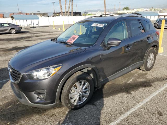 MAZDA CX-5 TOURI 2016 with VIN JM3KE2CY5G0658972 - Photo from auction