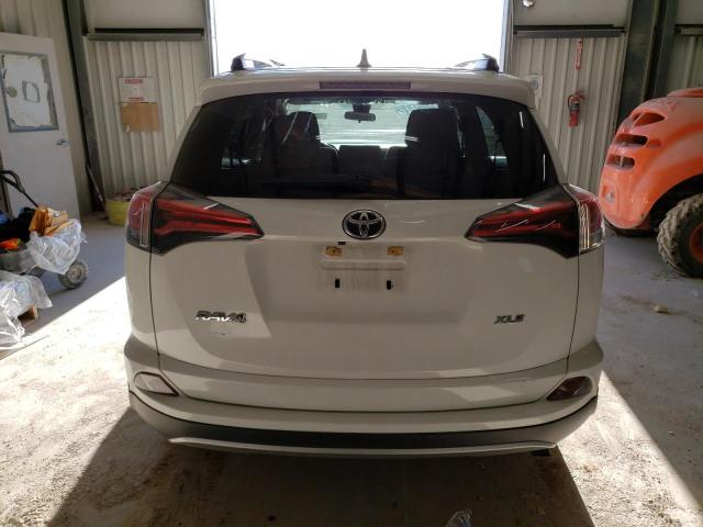 Photo 6 from auction – 2017 TOYOTA RAV4 XLE with VIN JTMWFREV9HJ131595