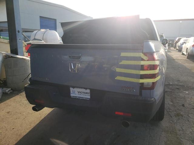 Photo 6 from auction – 2022 HONDA RIDGELINE with VIN 5FPYK3F15NB019979