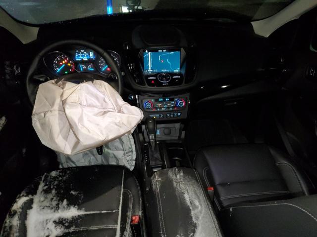 Photo 8 from auction – 2019 FORD ESCAPE TIT with VIN 1FMCU9J95KUC24021
