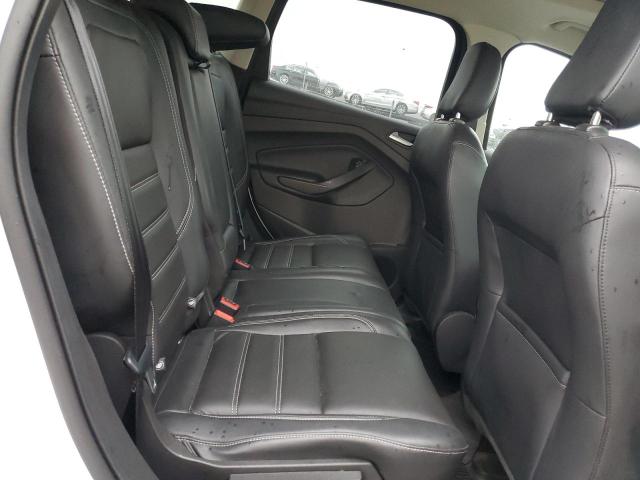 Photo 11 from auction – 2018 FORD ESCAPE TIT with VIN 1FMCU9J98JUC53639