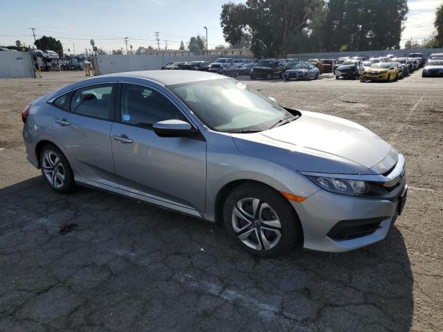 Photo 4 from auction – 2017 HONDA CIVIC LX with VIN 2HGFC2F51HH566452
