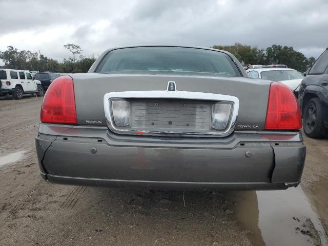 Photo 6 from auction – 2004 LINCOLN TOWN CAR E with VIN 1LNHM81W24Y655286