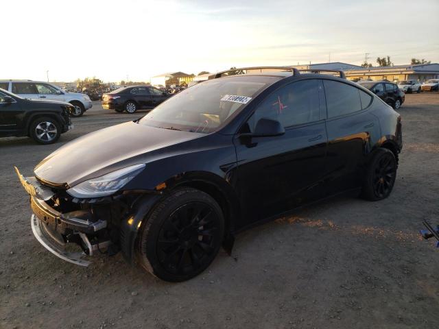 TESLA MODEL Y 2021 with VIN 5YJYGAEE4MF270185 - Photo from auction