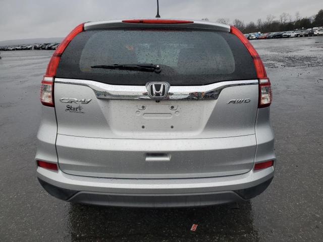 Photo 6 from auction – 2016 HONDA CR-V LX with VIN 5J6RM4H31GL128722