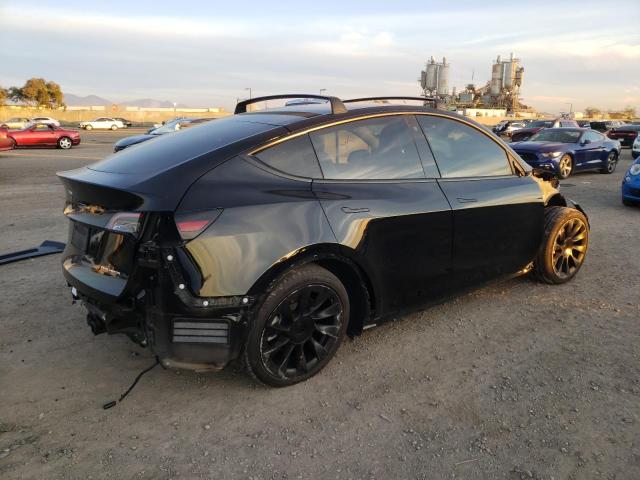 Photo 3 from auction – 2021 TESLA MODEL Y with VIN 5YJYGAEE4MF270185