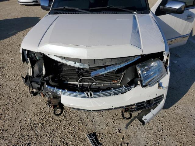Photo 12 from auction – 2013 LINCOLN NAVIGATOR with VIN 5LMJJ3H59DEL03511