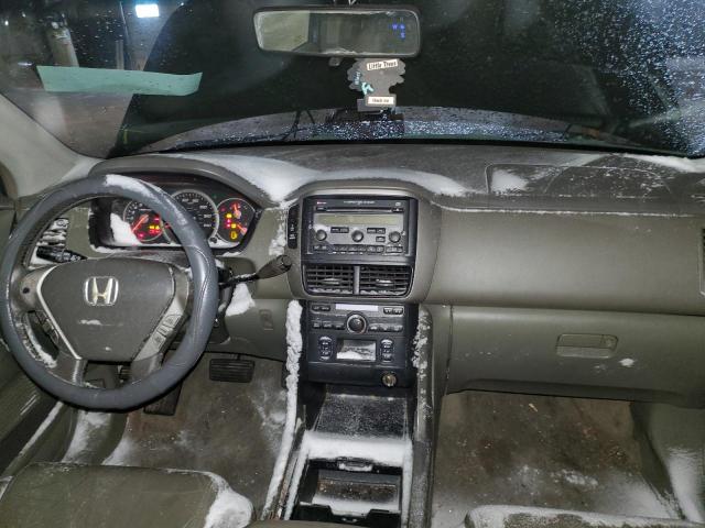 Photo 8 from auction – 2006 HONDA PILOT EX with VIN 2HKYF18536H534113
