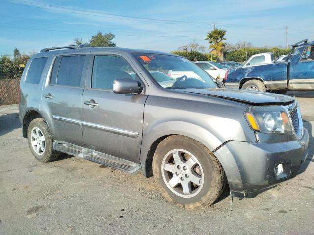 Photo 4 from auction – 2011 HONDA PILOT TOUR with VIN 5FNYF4H96BB048909