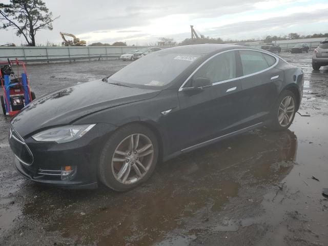 TESLA MODEL S 2014 with VIN 5YJSA1S15EFP46955 - Photo from auction