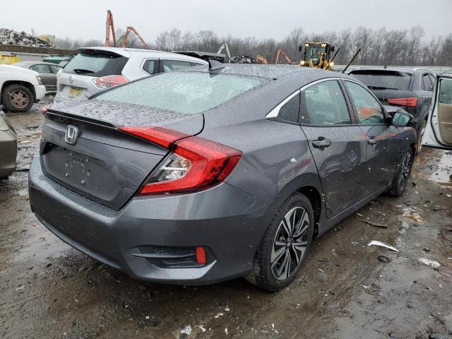 Photo 3 from auction – 2017 HONDA CIVIC EX with VIN 2HGFC1F34HH655683