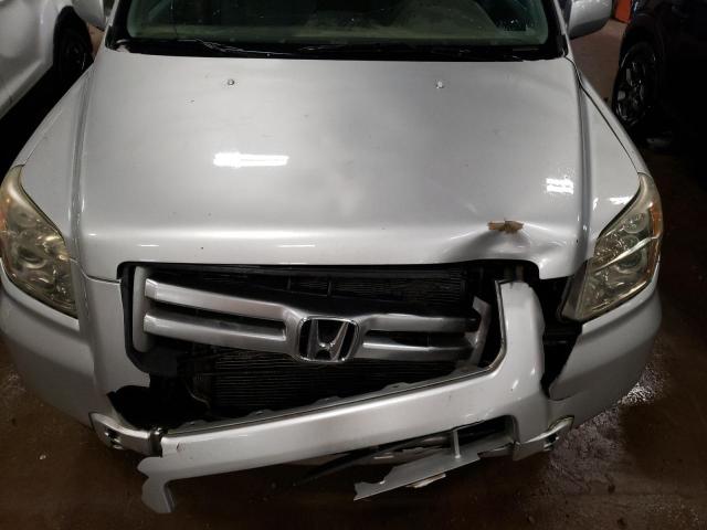 Photo 12 from auction – 2006 HONDA PILOT EX with VIN 5FNYF28446B003465