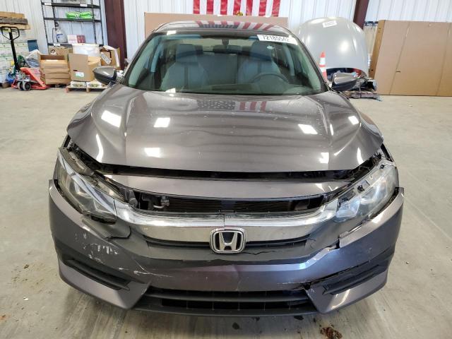 Photo 5 from auction – 2016 HONDA CIVIC LX with VIN 19XFC2F51GE049418