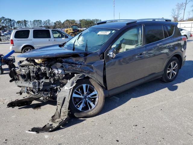 Photo 1 from auction – 2016 TOYOTA RAV4 XLE with VIN JTMWFREV7GJ094352