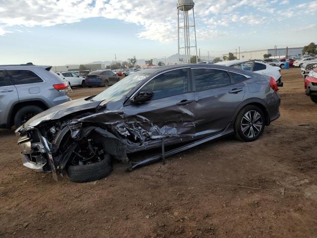 HONDA CIVIC EX 2018 with VIN JHMFC1F39JX035202 - Photo from auction