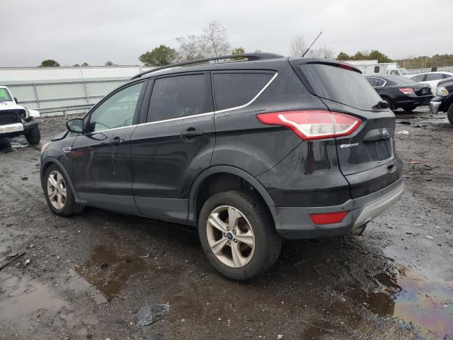 Photo 2 from auction – 2016 FORD ESCAPE SE with VIN 1FMCU9GX5GUB50337