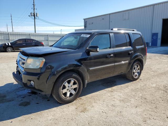 HONDA PILOT TOUR 2011 with VIN 5FNYF4H95BB084817 - Photo from auction